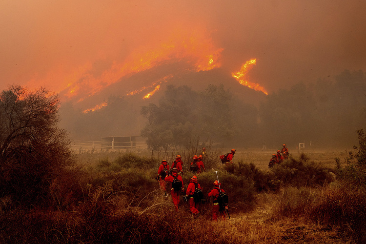 Thousands of people were urged to evacuate the Los Angeles area due to the fires