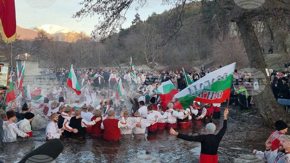 Over 100 Brave Icy Tundzha River in Kalofer for Traditional Horo Dance on Epiphany