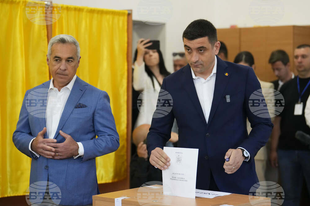 George Simion, Calin Georgescu Vote Together in Romania's Presidential Election First Round