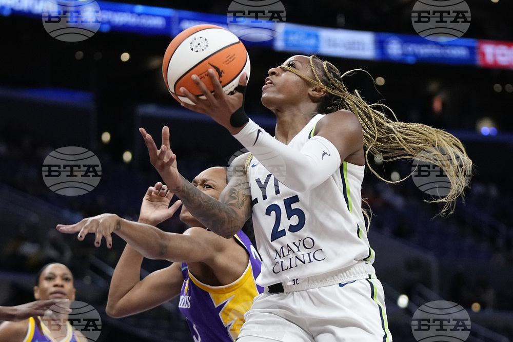 Los Angeles Sparks' Karlie Samuelson tries to pass during the second half  of a WNBA basketball game against the Minnesota Lynx Tuesday, June 20, 2023,  in Los Angeles. (AP Photo/Mark J. Terrill