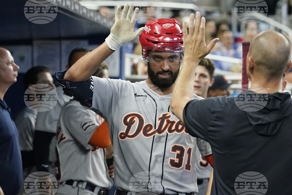 Detroit Tigers' Miguel Cabrera (24) holds his right wrist after batting  during the second inning of a baseball game against the Miami Marlins,  Sunday, July 30, 2023, in Miami. (AP Photo/Marta Lavandier