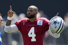 Dallas Cowboys wide receiver David Durden, top, attempts to make a catch as  cornerback Eric Scott Jr. defends during the NFL football team's training  camp Monday, July 31, 2023, in Oxnard, Calif. (