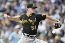 Miami Heat basketball player Tyler Herro throws out a ceremonial first  pitch before a baseball game between the Pittsburgh Pirates and the  Milwaukee Brewers, Saturday, Aug 5, 2023, in Milwaukee. (AP Photo/Jeffrey