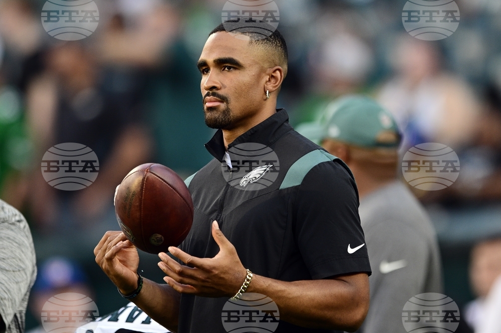 Cleveland Browns safety Ronnie Hickman Jr. intercepts a pass in front of Philadelphia  Eagles tight end Grant Calcaterra (81) during the first half of an NFL  preseason football game Thursday, Aug. 17