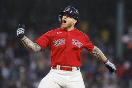 Los Angeles Dodgers' Freddie Freeman (5) scores behind Boston Red Sox  catcher Connor Wong on a sacrifice fly by David Peralta during the ninth  inning of a baseball game, Friday, Aug. 25