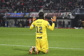 Nicolas Fernandez of Argentina's Defensa y Justicia, second right, scores  his team's first goal against Brazil's Botafogo during a Copa Sudamericana  quarterfinal, second leg soccer match at Florencio Sola stadium in Lanus