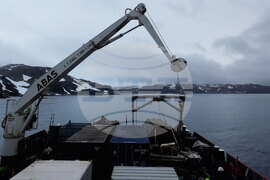 The Bulgarian naval research vessel Sv. Sv. Kiril i Metodii (RSV 421) crew and the logistics team at the Bulgarian Antarctic base clean the shore