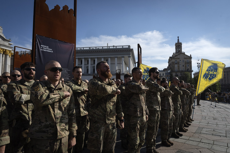 A Russian neo-Nazi has been accused of war crimes committed in Ukraine